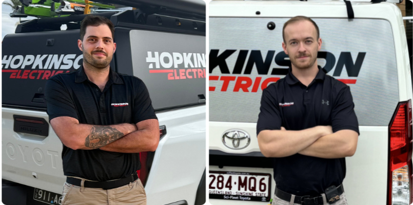 Hopkinson Electrical team with branded service vehicles